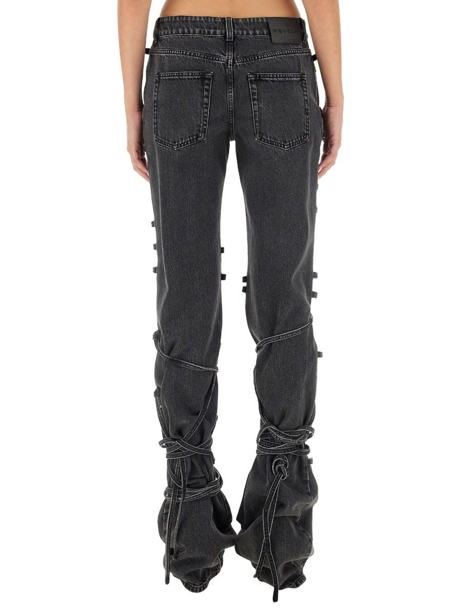 ALEXANDER McQUEEN JEANS CON DETTAGLIO ANNODATO IN DENIM DI COTONE