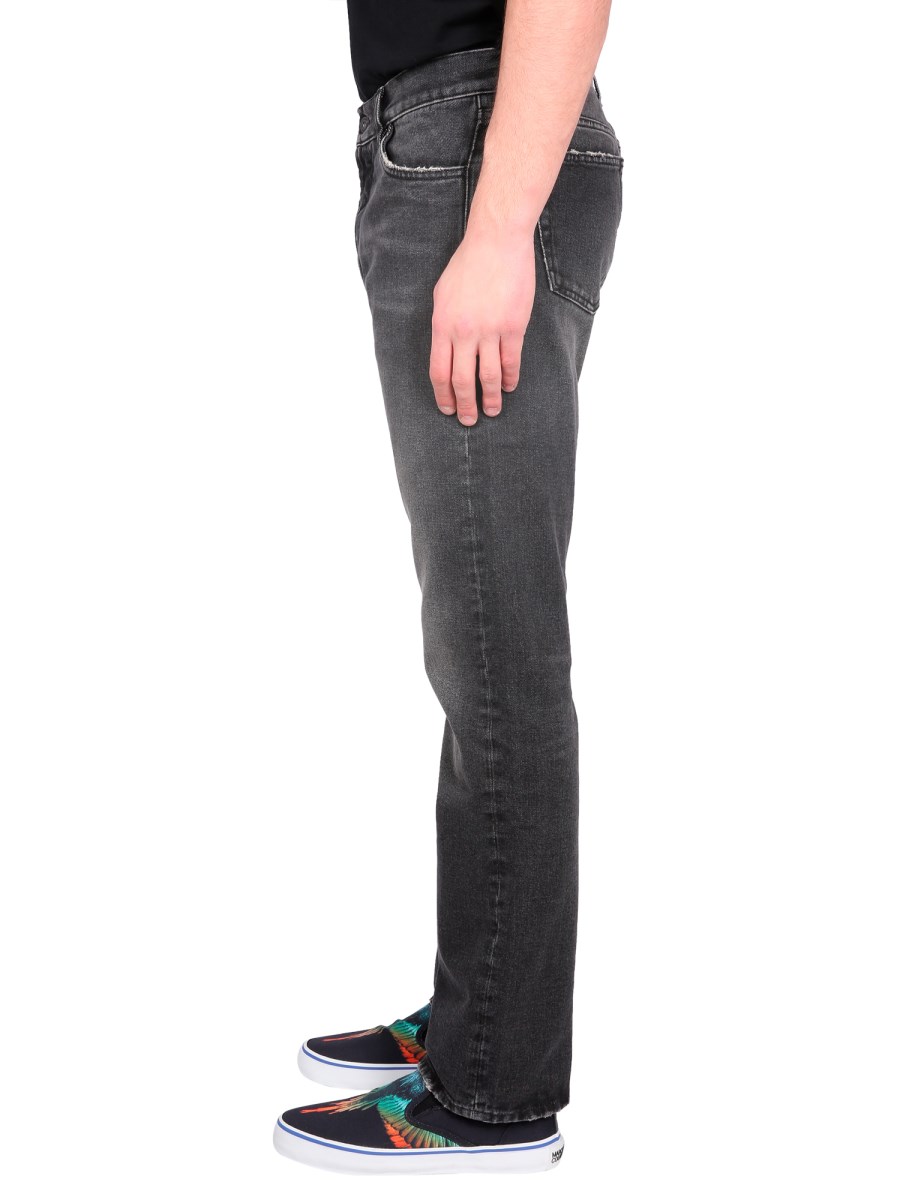 MARCELO BURLON COUNTY OF MILAN JEANS CROSS IN DENIM DI COTONE
