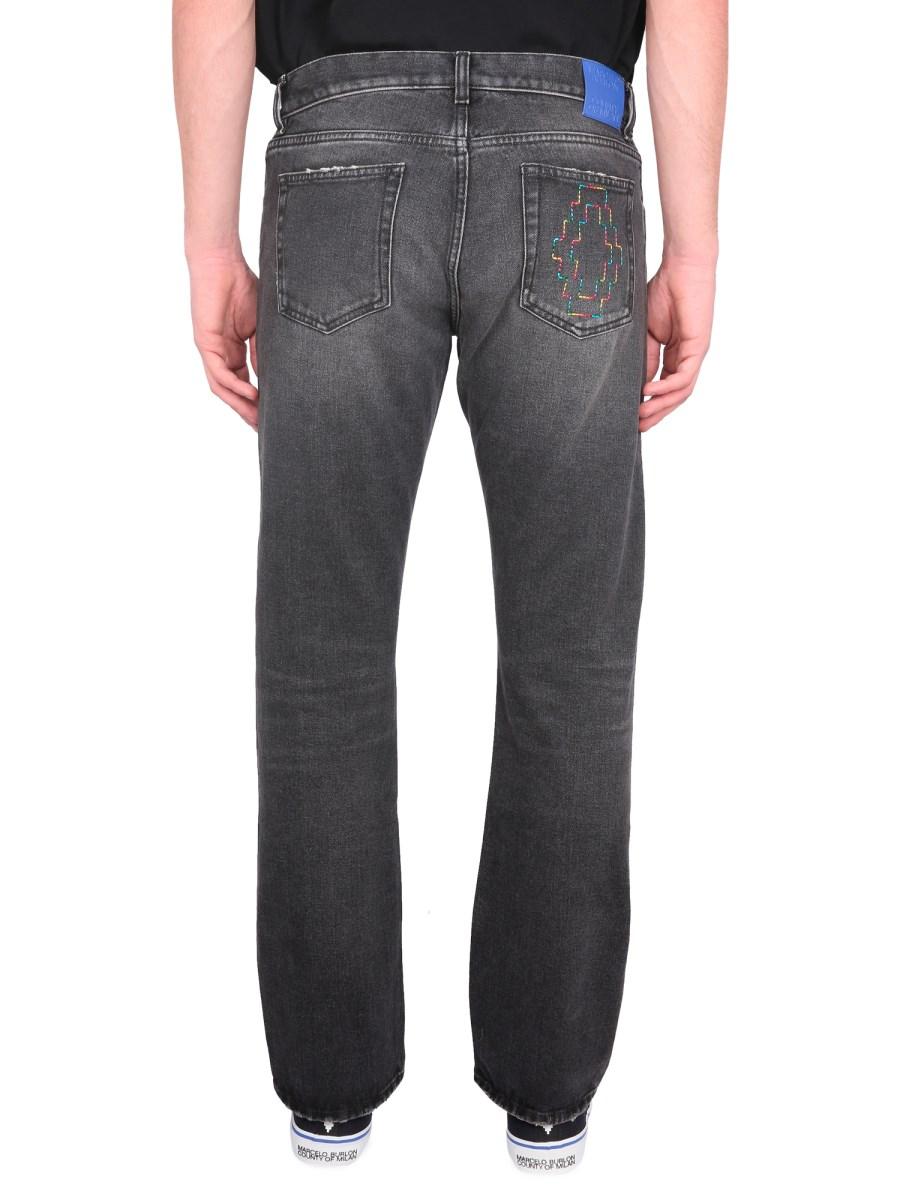 MARCELO BURLON COUNTY OF MILAN JEANS CROSS IN DENIM DI COTONE