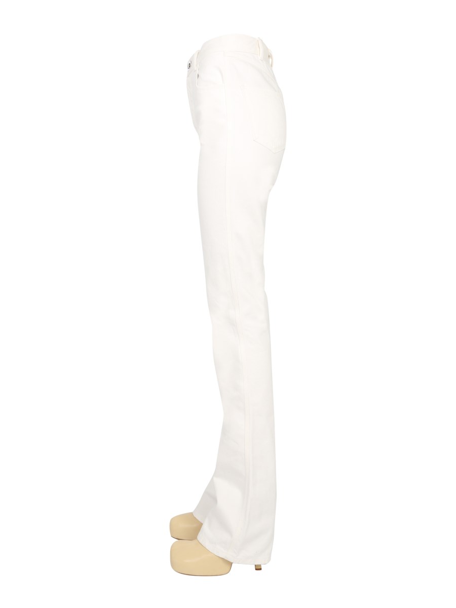 BOTTEGA VENETA JEANS FLARE IN DENIM DI COTONE CON BOTTONE OVALE