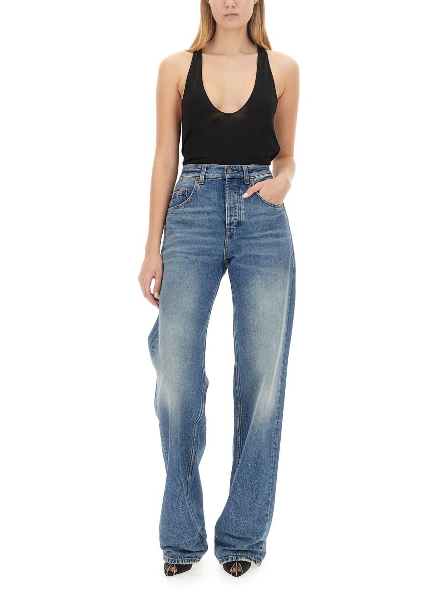 SAINT LAURENT JEANS LARGHI EXTRA-LUNGHI IN DENIM EFFETTO STROPICCIATO