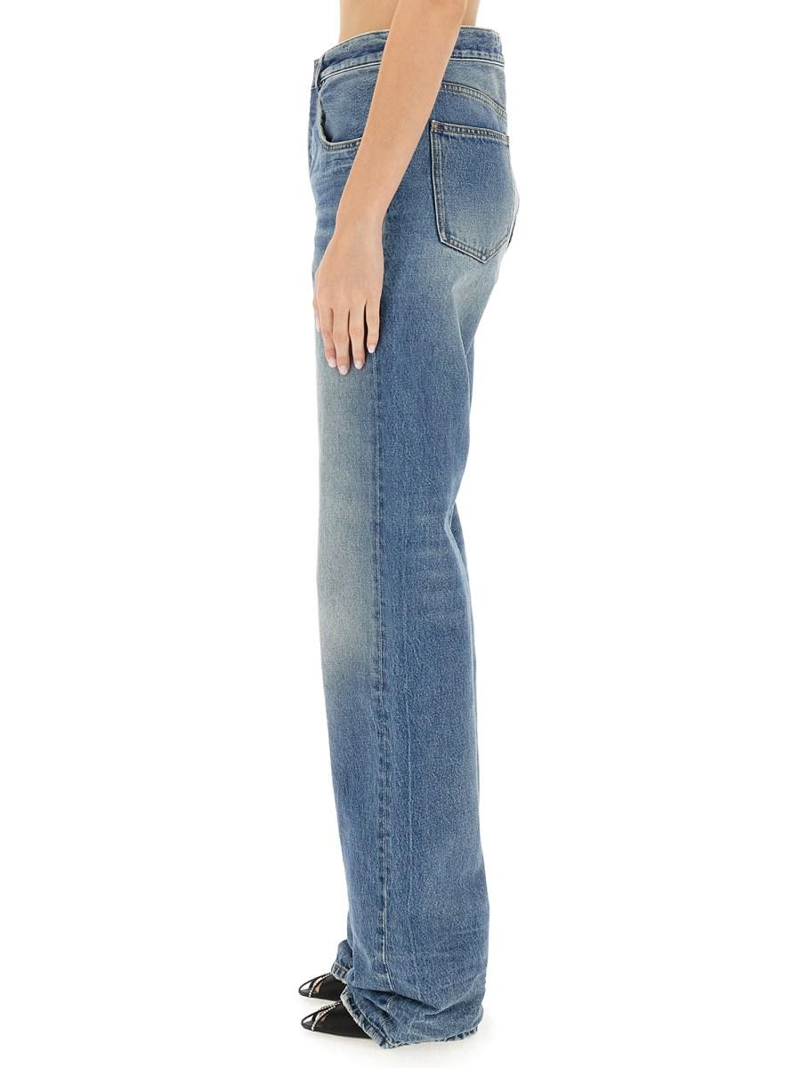 SAINT LAURENT JEANS LARGHI EXTRA-LUNGHI IN DENIM EFFETTO STROPICCIATO