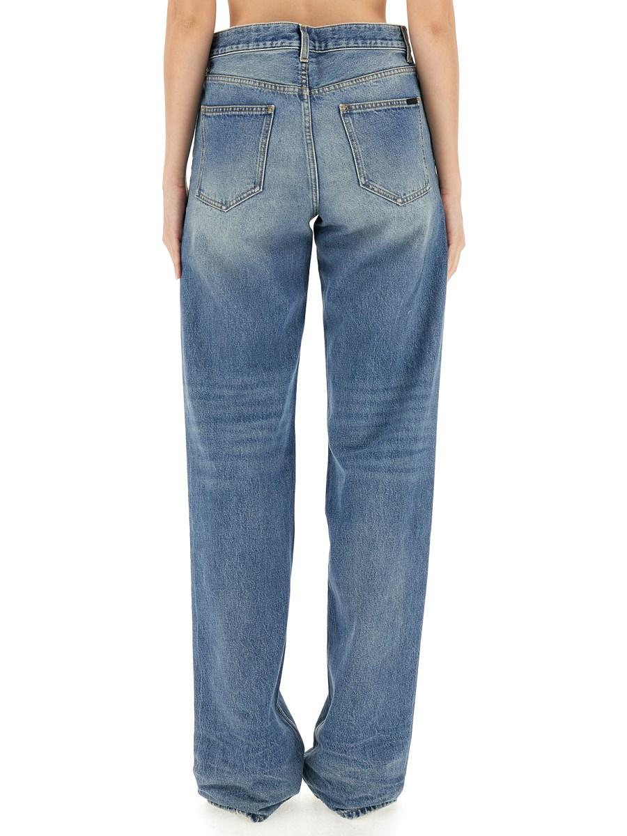 SAINT LAURENT JEANS LARGHI EXTRA-LUNGHI IN DENIM EFFETTO STROPICCIATO