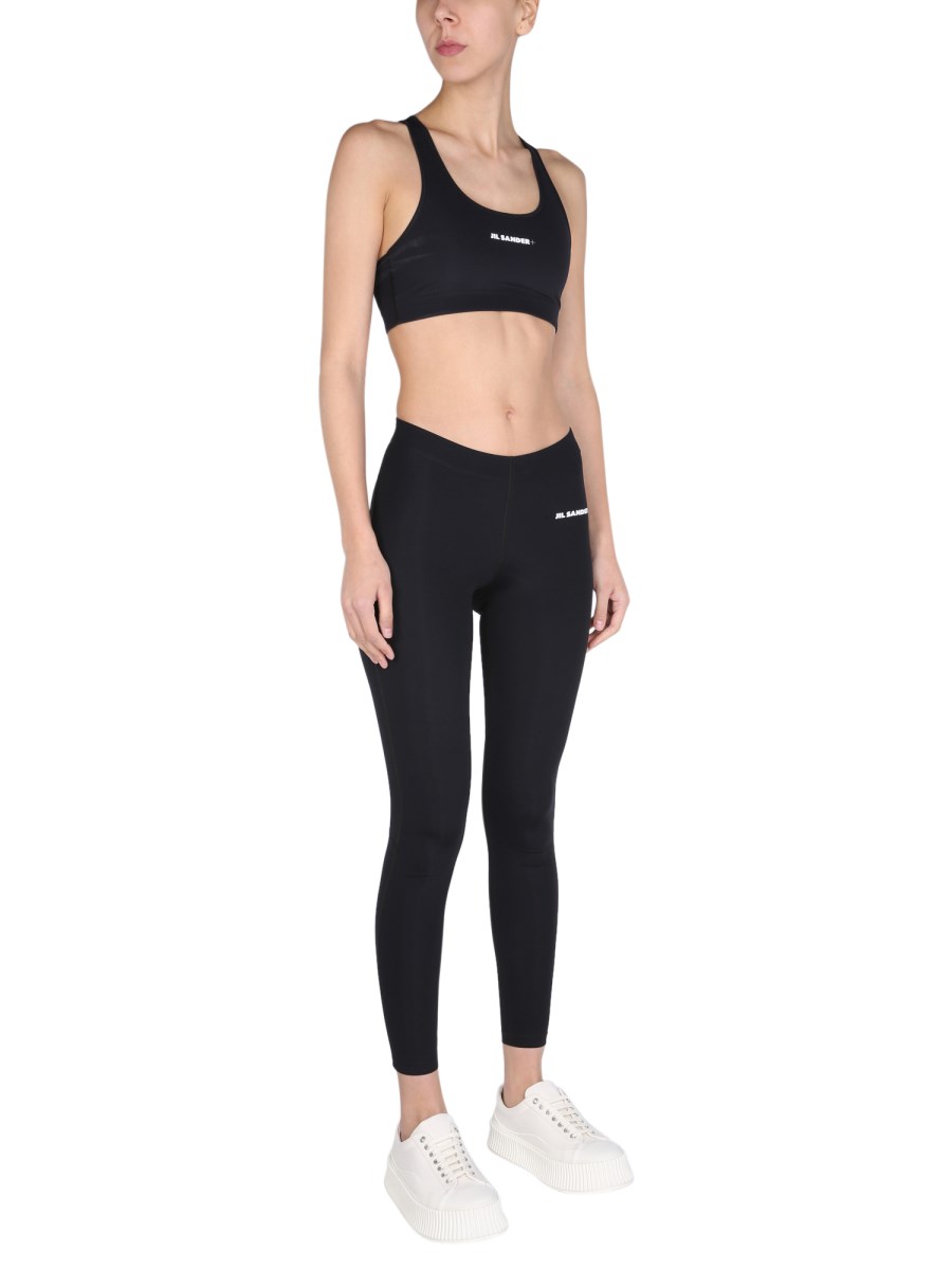 JIL SANDER LEGGINGS IN NYLON CON STAMPA LOGO