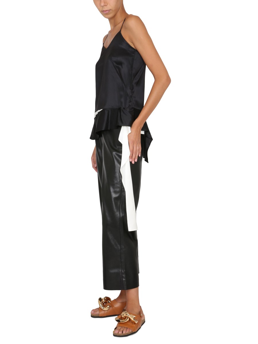 JW ANDERSON TOP IN ACETATO CON SCOLLO A CUORE