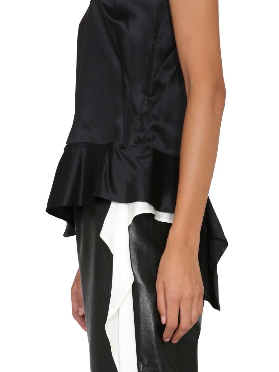 JW ANDERSON TOP IN ACETATO CON SCOLLO A CUORE