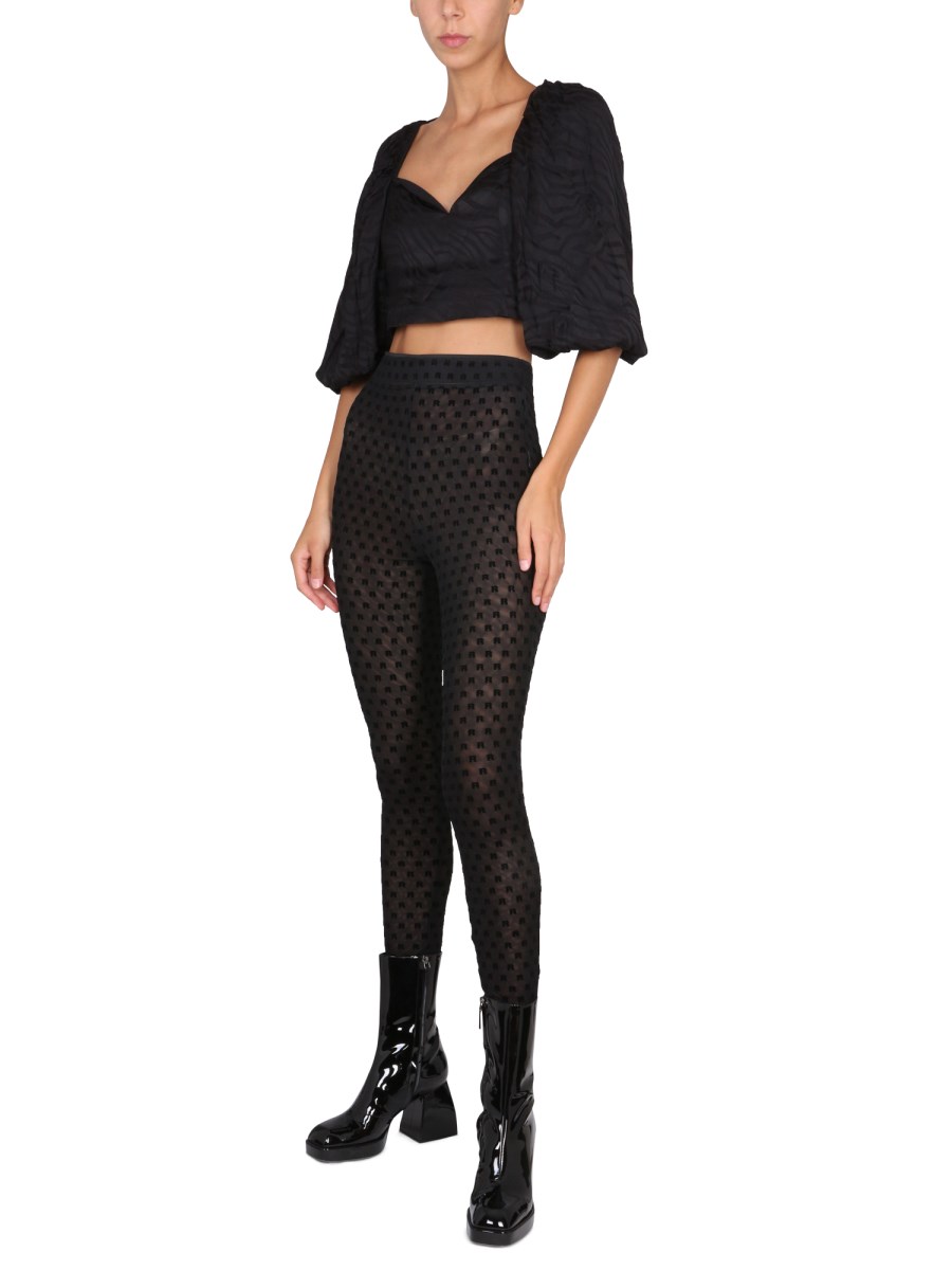 ROTATE BIRGER CHRISTENSEN LEGGINGS CON LOGO ALL OVER