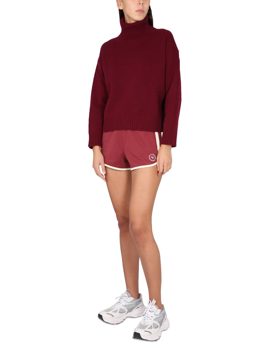 SPORTY&RICH MAGLIA IN LANA CON COLLO ALTO E RICAMO LOGO