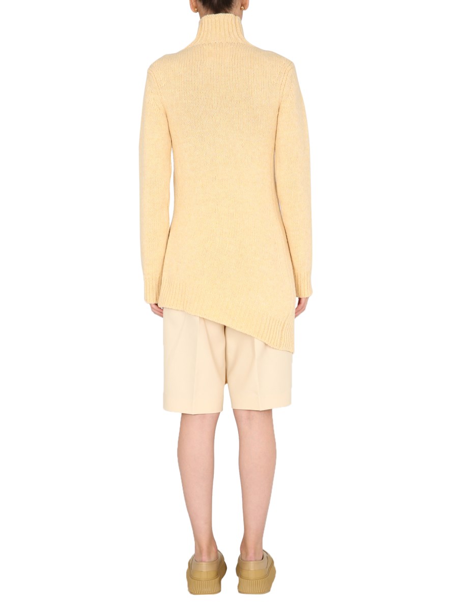 JIL SANDER MAGLIA LUNGA ASIMMETRICA IN LANA VERGINE