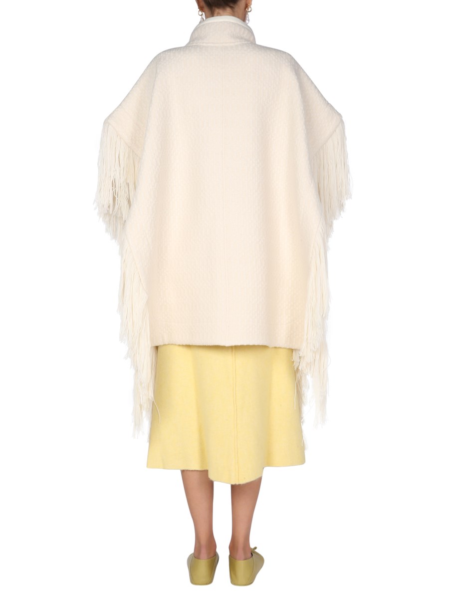 JIL SANDER MANTELLA IN JACQUARD DI LANA MERINO CON ORLO A FRANGE