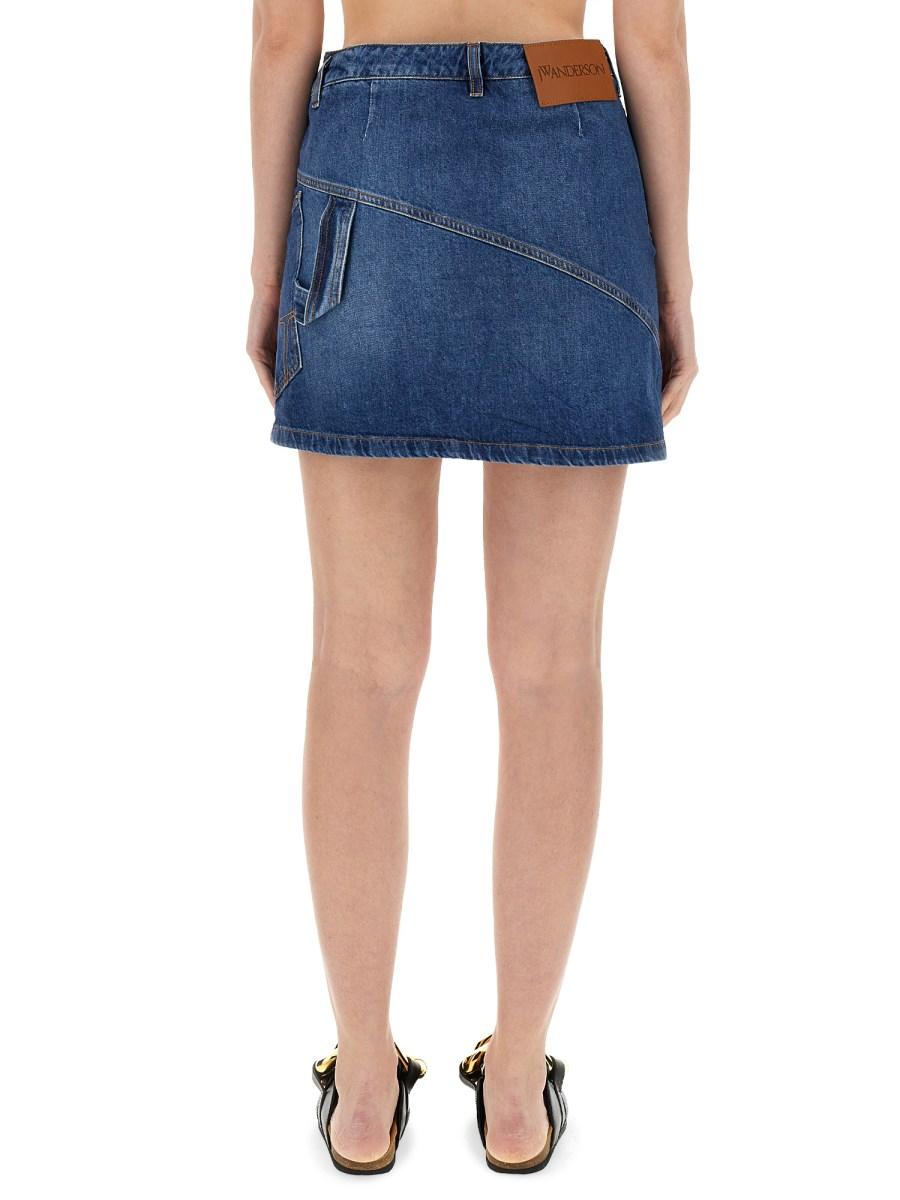 JW ANDERSON MINIGONNA IN DENIM CON DESIGN ATTORCIGLIATO