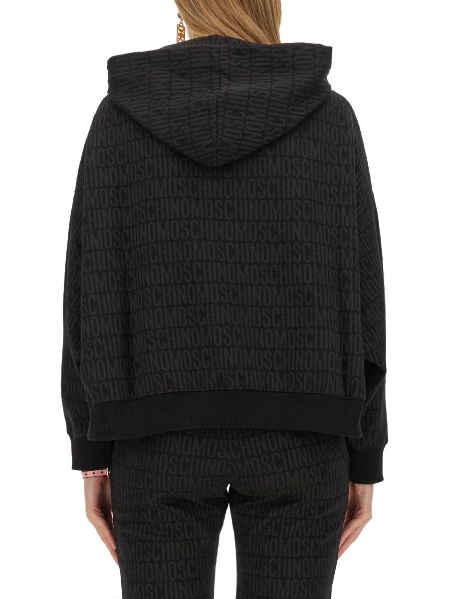 MOSCHINO FELPA CON LOGO ALL OVER