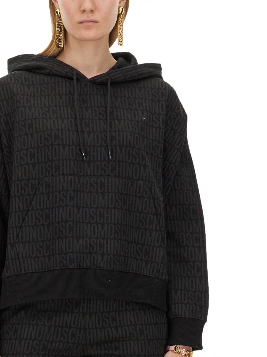 MOSCHINO FELPA CON LOGO ALL OVER