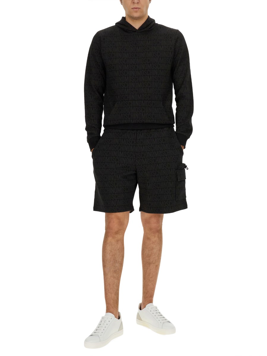 MOSCHINO FELPA CON LOGO ALL OVER