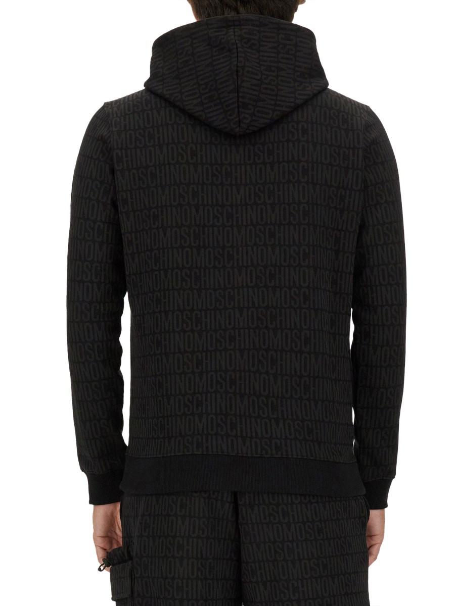 MOSCHINO FELPA CON LOGO ALL OVER