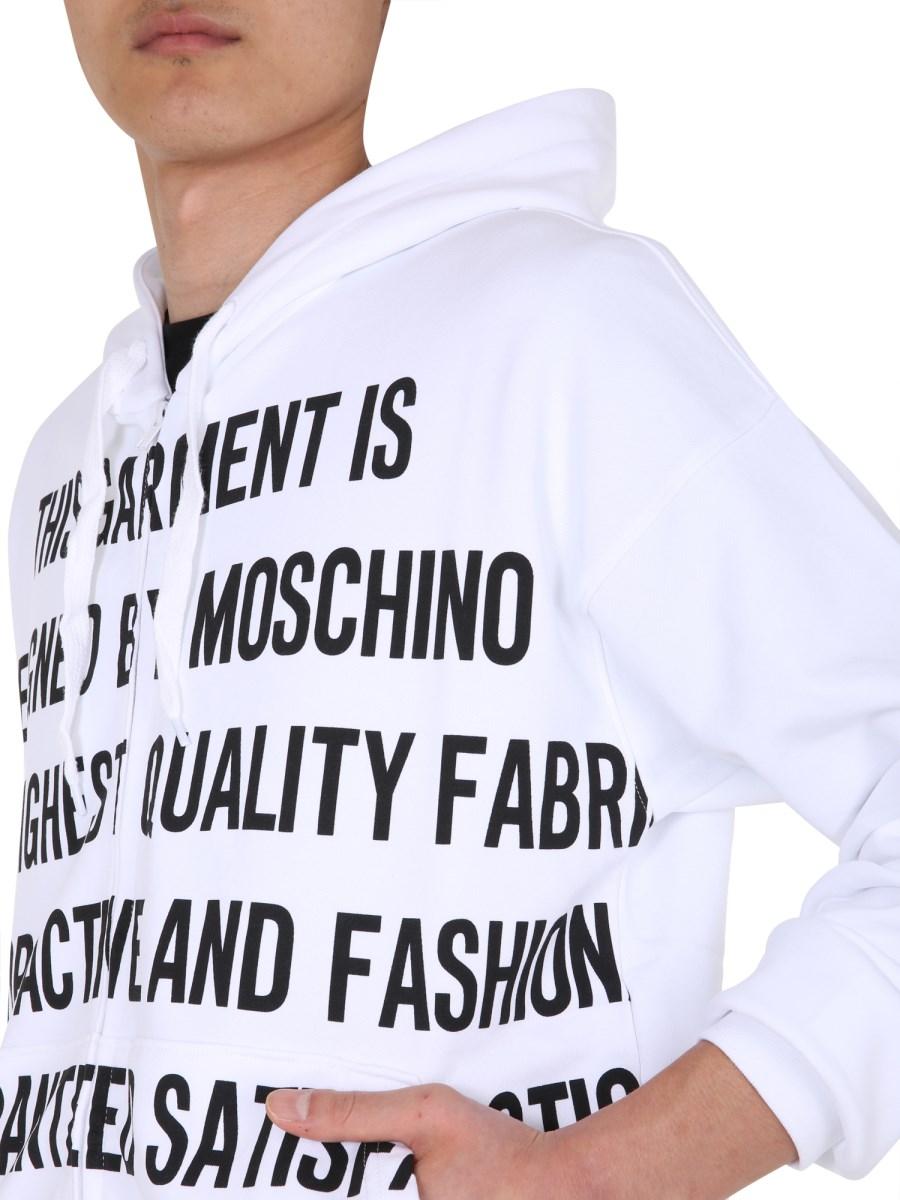 MOSCHINO FELPA IN COTONE CON ZIP E STAMPA SLOGAN