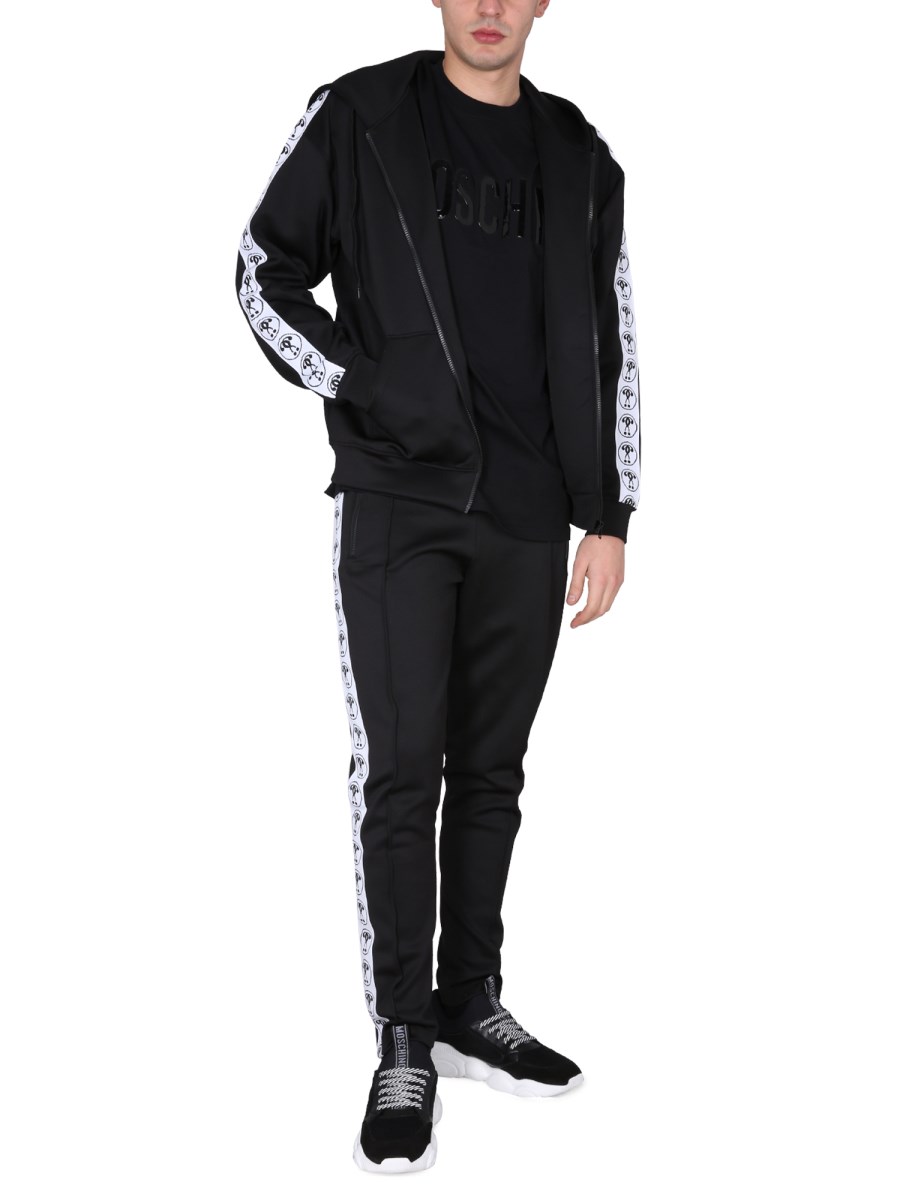 MOSCHINO FELPA IN TESSUTO TECNICO CON LOGO