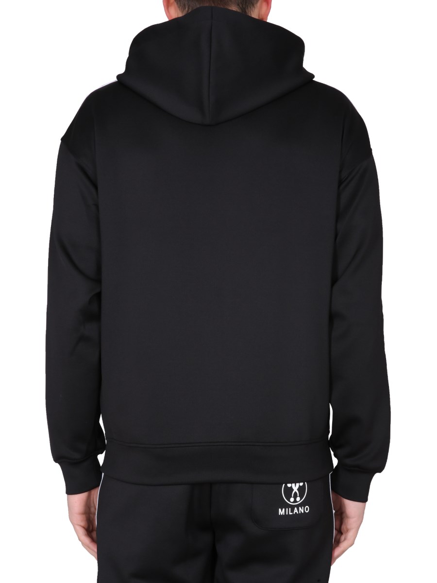 MOSCHINO FELPA IN TESSUTO TECNICO CON LOGO