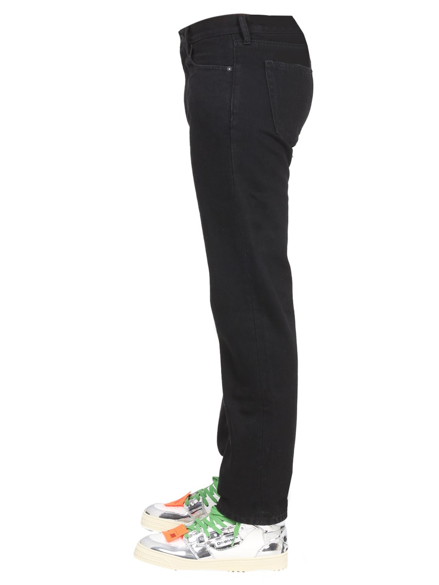 OFF-WHITE JEANS IN COTONE CON STAMPA LOGO