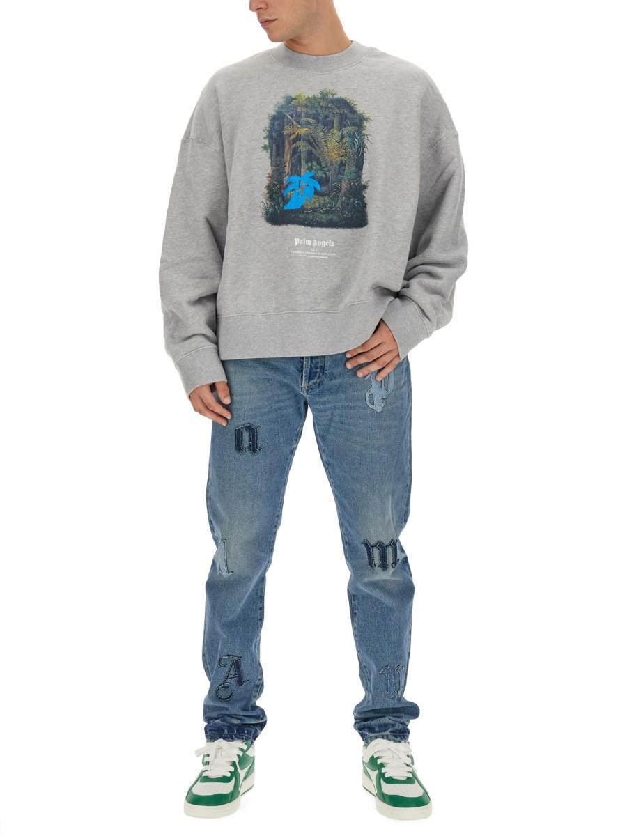 PALM ANGELS JEANS A CINQUE TASCHE CON PATCH LOGO