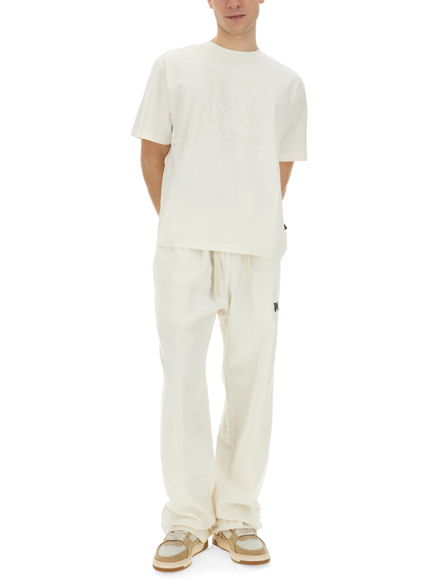 PALM ANGELS PANTALONE IN LYOCEL CON LOGO