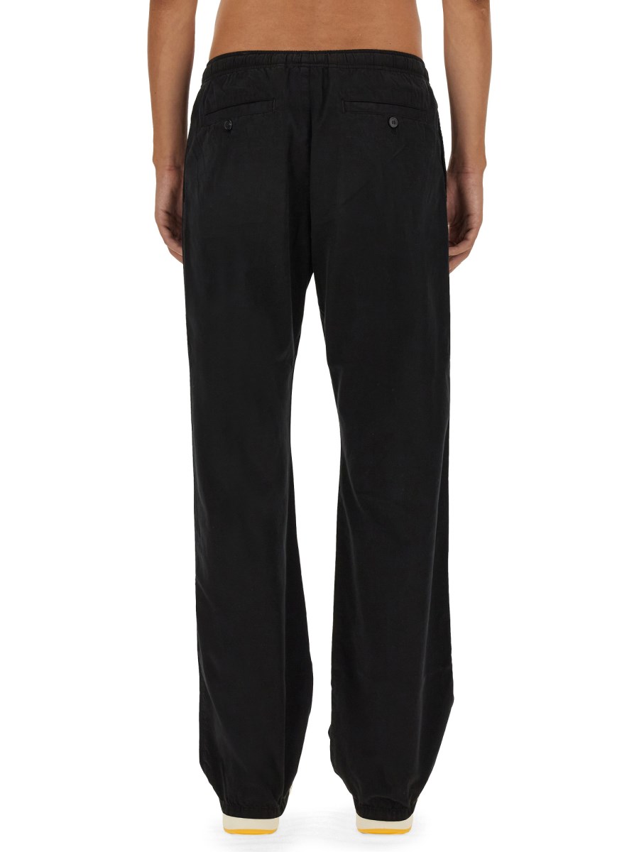 PALM ANGELS PANTALONE MONOGRAM IN FELPA DI COTONE