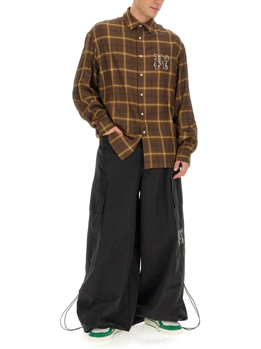 PALM ANGELS PANTALONI PARACHUTE CON MONOGRAM