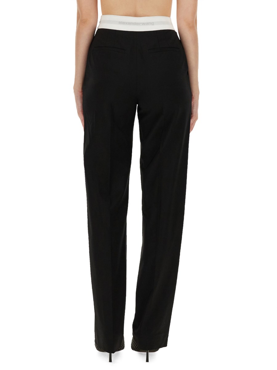 ALEXANDER WANG PANTALONE A VITA ALTA ELASTICIZZATI CON PIEGHE E LOGO