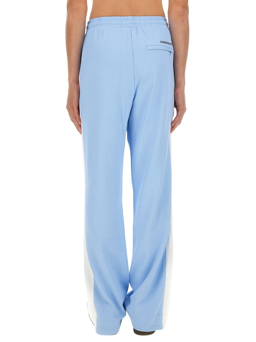CASABLANCA PANTALONE CON BANDA LOGO IN TESSUTO TECNICO