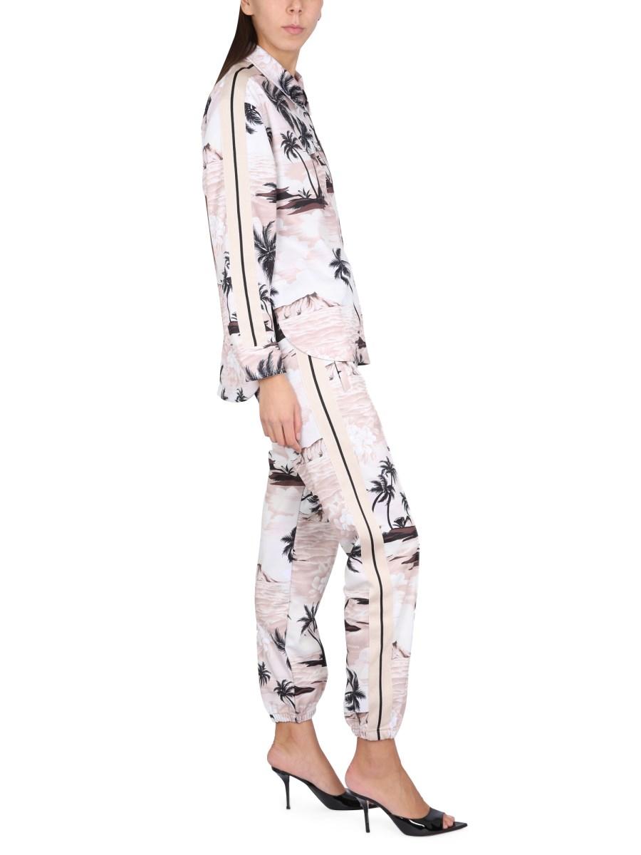 PALM ANGELS PANTALONE CON STAMPA ISLAND IN TESSUTO TECNICO