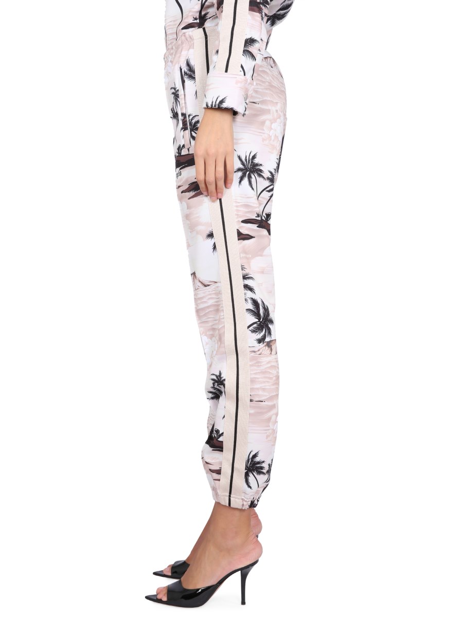PALM ANGELS PANTALONE CON STAMPA ISLAND IN TESSUTO TECNICO