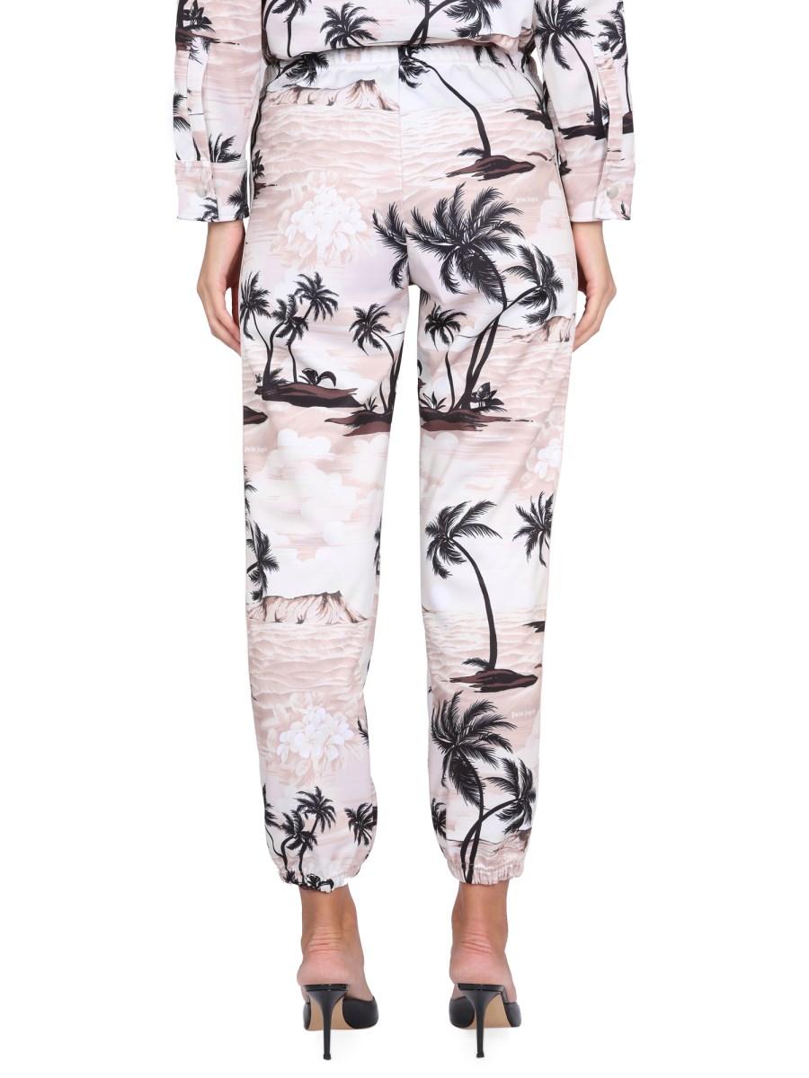 PALM ANGELS PANTALONE CON STAMPA ISLAND IN TESSUTO TECNICO