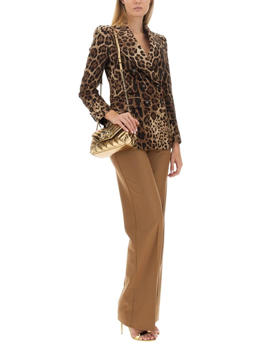 DOLCE & GABBANA PANTALONE FLARE IN FLANELLA CON PLACCA LOGO