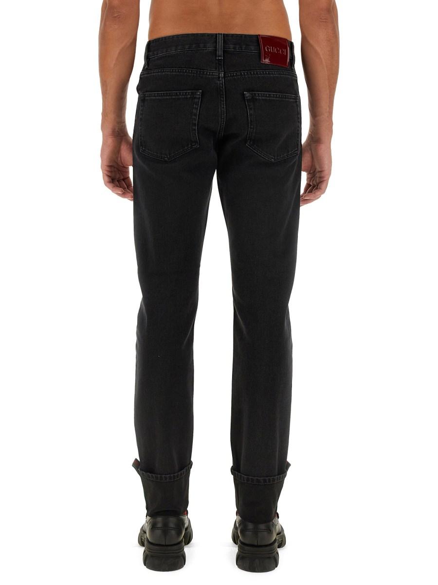 GUCCI PANTALONE IN DENIM DI COTONE CON DETTAGLI WEB