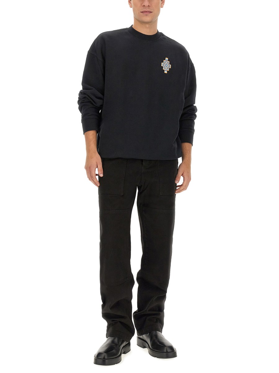 MARCELO BURLON COUNTY OF MILAN PANTALONE IN DENIM DI COTONE