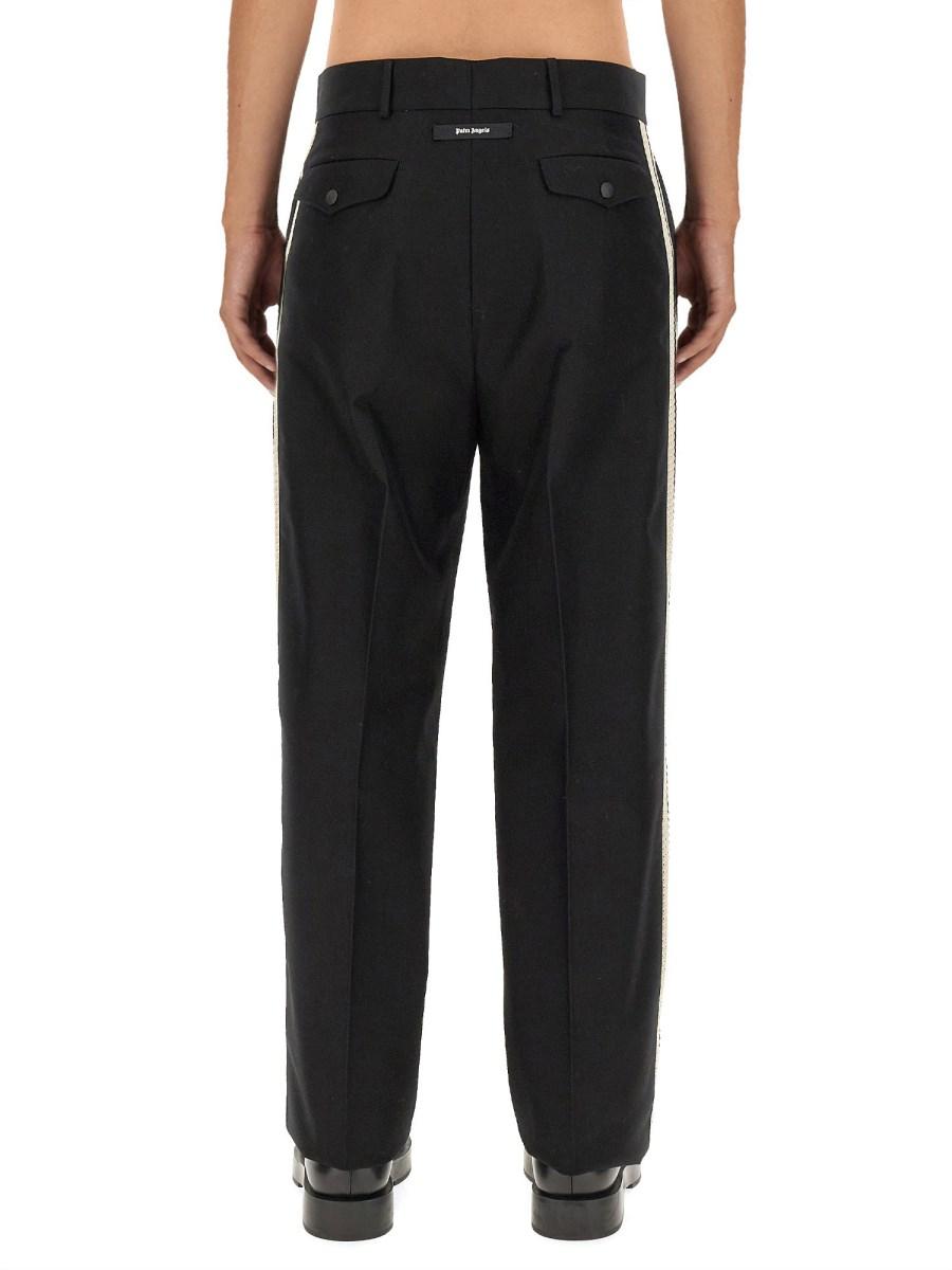 PALM ANGELS PANTALONE IN TESSUTO TECNICO CON BANDA LOGO