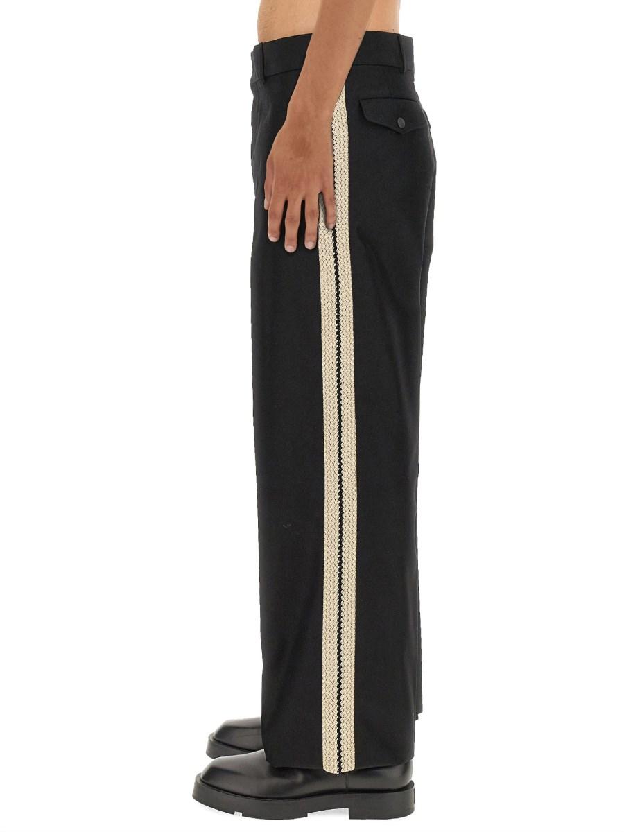 PALM ANGELS PANTALONE IN TESSUTO TECNICO CON BANDA LOGO