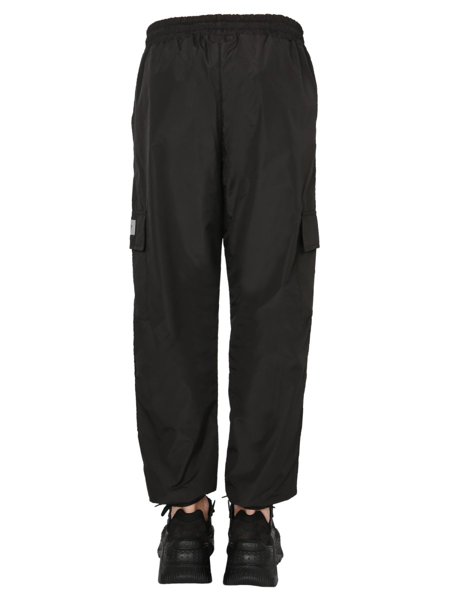 DISCLAIMER PANTALONE IN TESSUTO TECNICO CON COULISSE E TASCHE CARGO