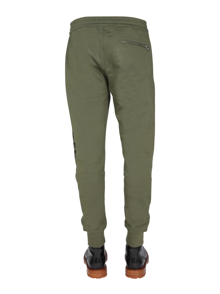 ALEXANDER McQUEEN PANTALONE JOGGING CON LOGO GRAFFITI