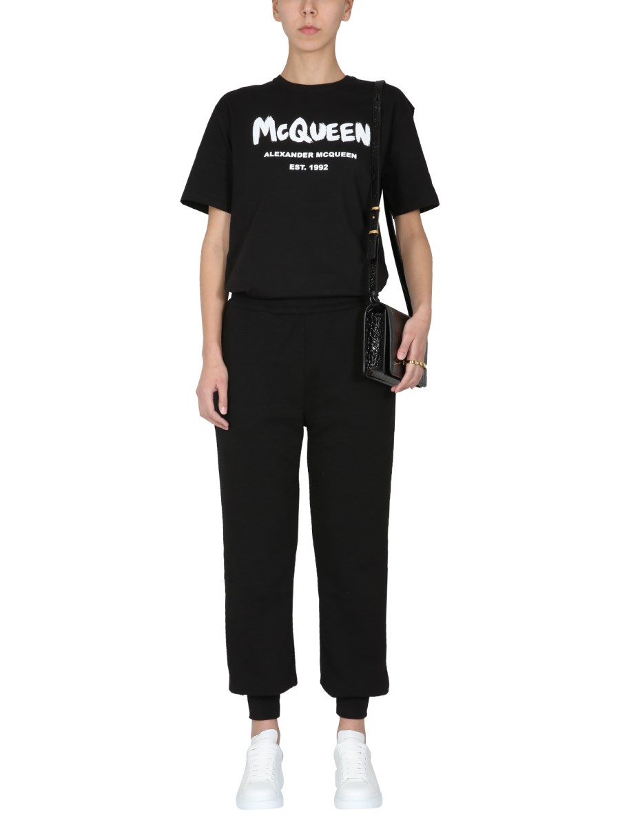 ALEXANDER McQUEEN PANTALONE JOGGING IN COTONE CON STAMPA LOGO