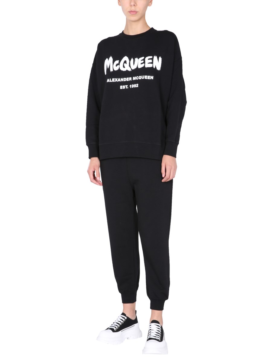 ALEXANDER McQUEEN PANTALONE JOGGING IN COTONE CON STAMPA LOGO