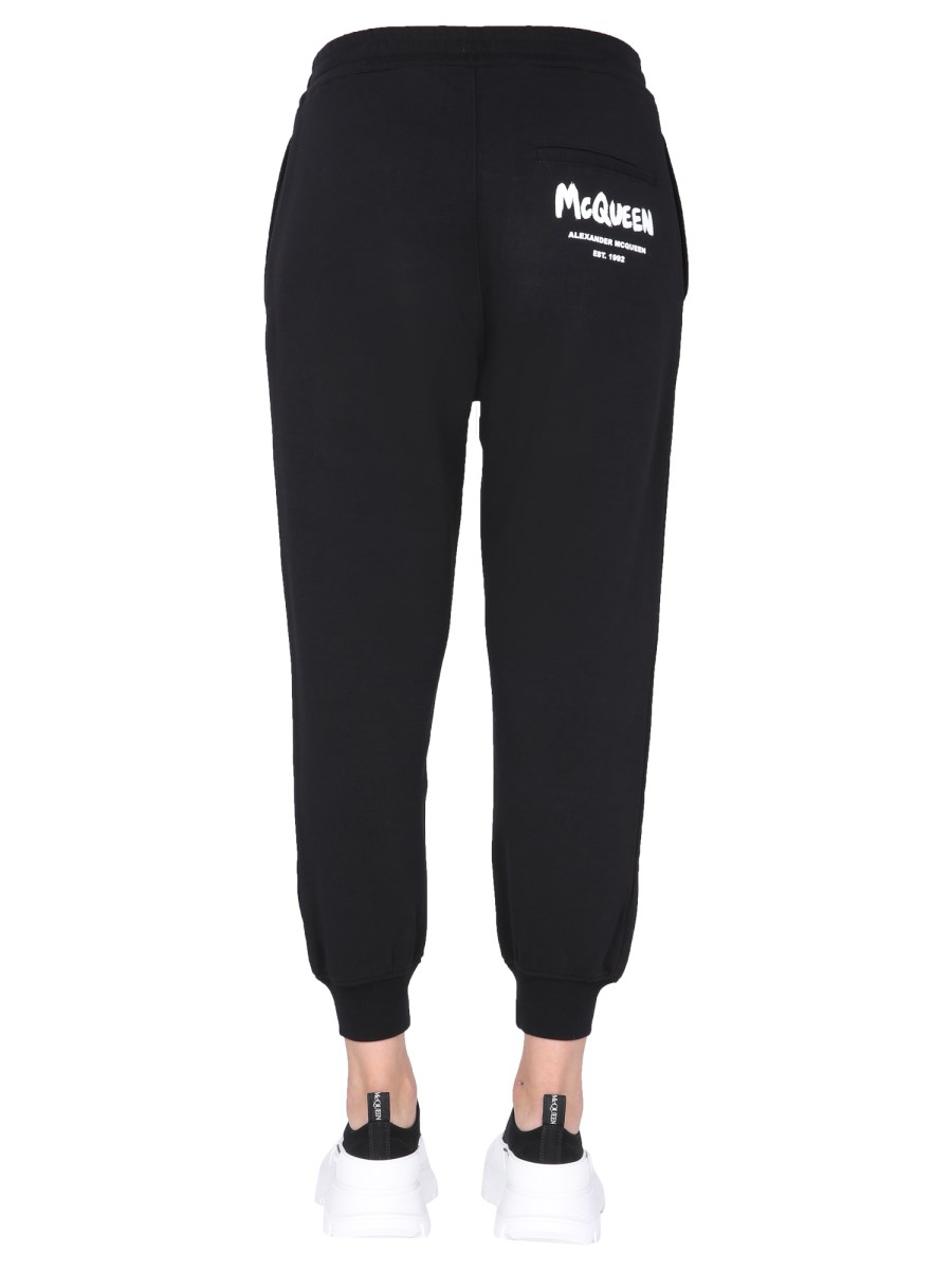 ALEXANDER McQUEEN PANTALONE JOGGING IN COTONE CON STAMPA LOGO