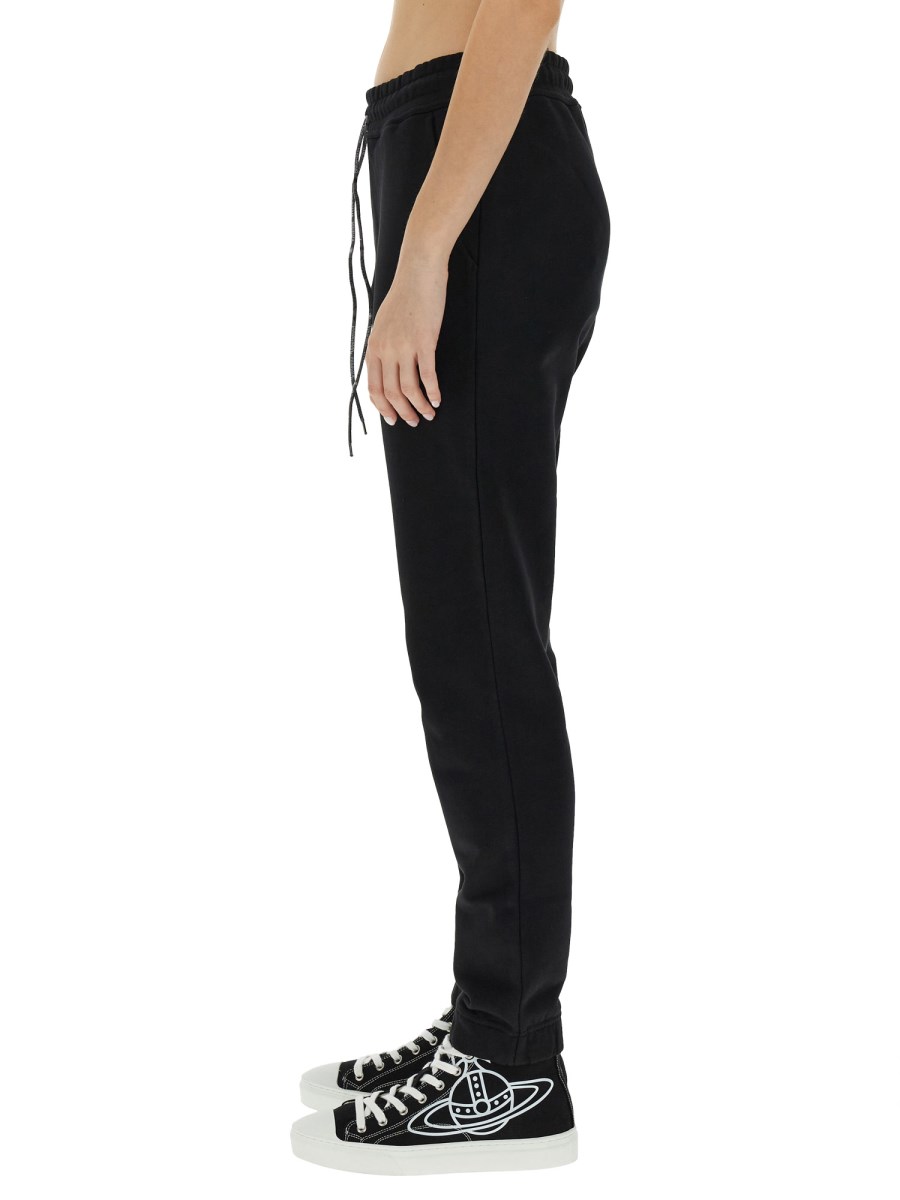 VIVIENNE WESTWOOD PANTALONE JOGGING IN COTONE CON STAMPA SPRAY ORB