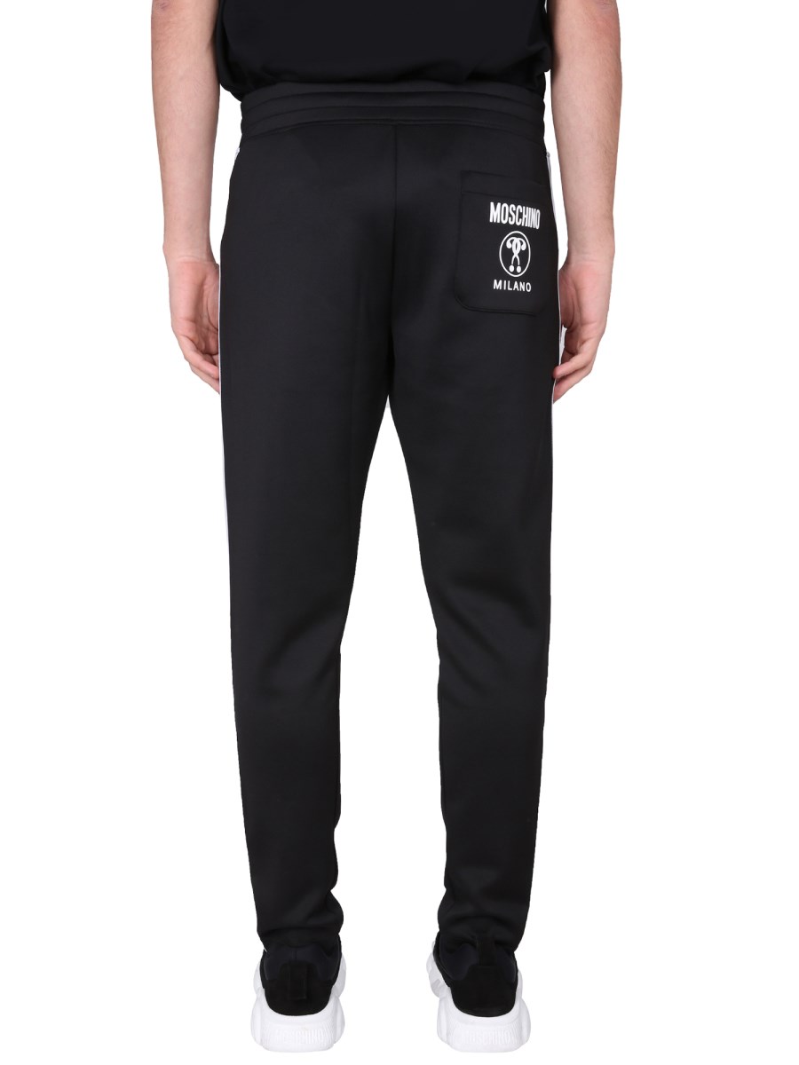MOSCHINO PANTALONE JOGGING IN FELPA TECNICA CON LOGO JACQUARD
