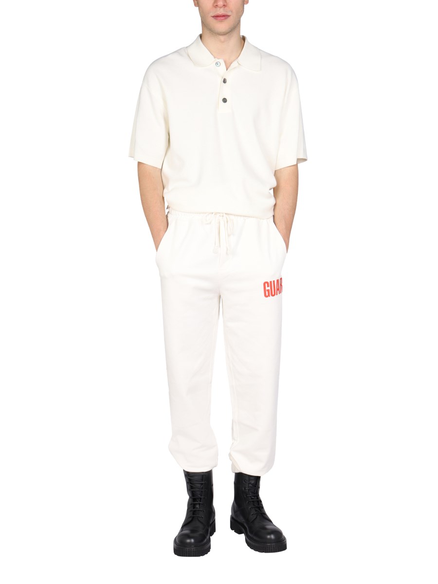 HELMUT LANG PANTALONE JOGGING IN JERSEY DI COTONE CON STAMPA LOGO