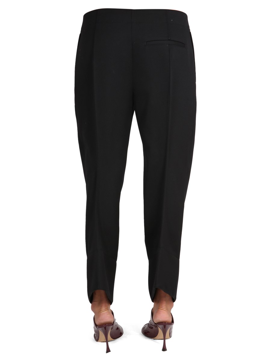 BOTTEGA VENETA PANTALONI IN LANA COMPATTA CON GAMBE CURVE