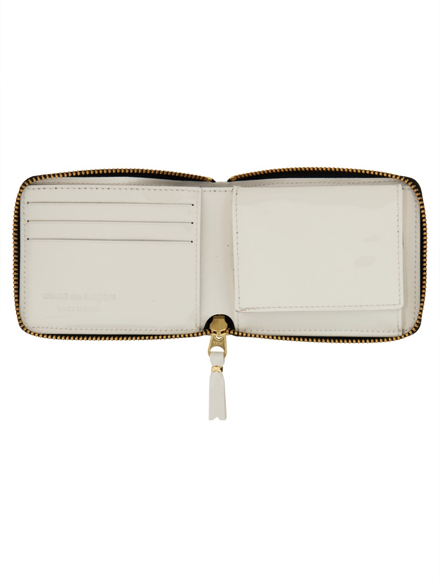 COMME DES GARCONS WALLET PORTAFOGLIO IN PELLE REVERSED HEM CON ZIP