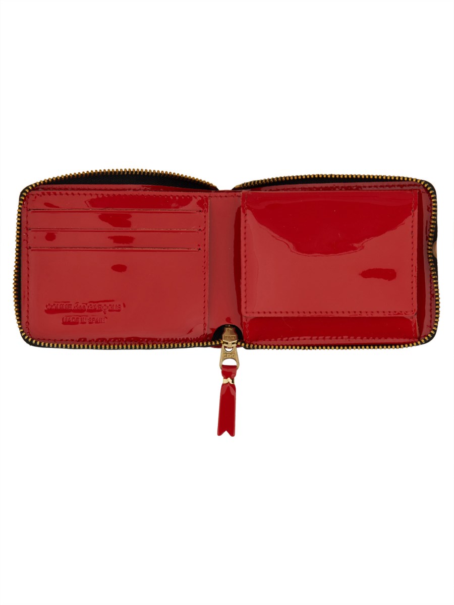 COMME DES GARCONS WALLET PORTAFOGLIO IN PELLE REVERSED HEM CON ZIP