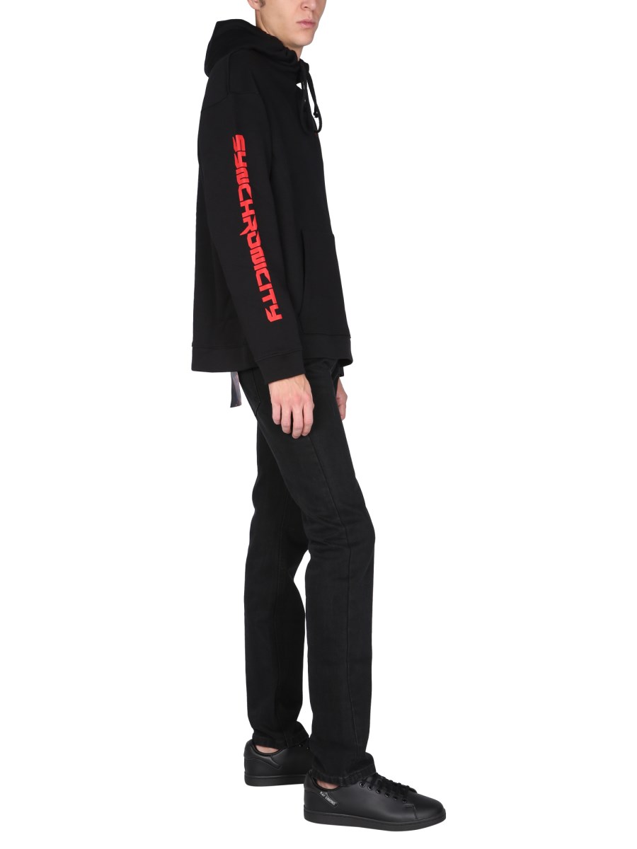 RAF SIMONS FELPA "SINCHRONICITY" IN COTONE