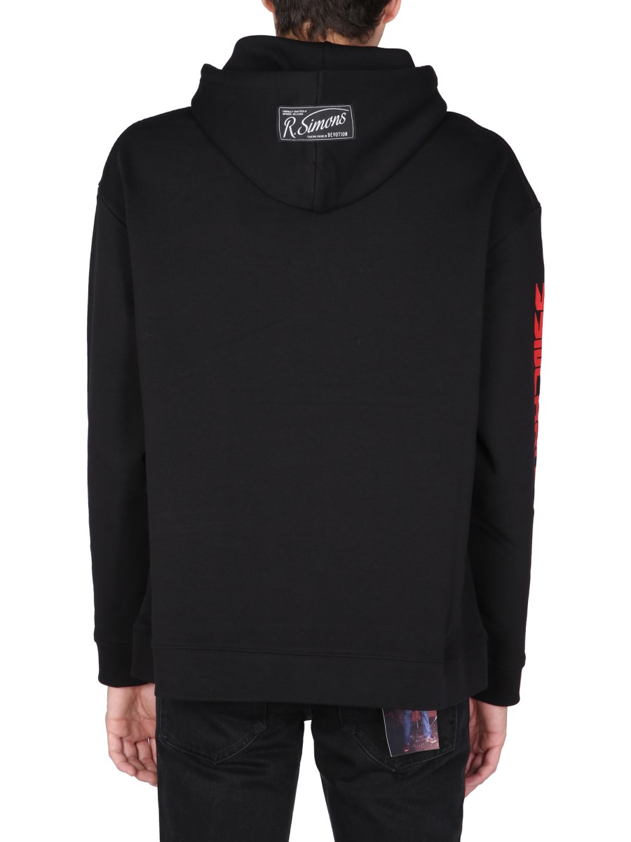 RAF SIMONS FELPA "SINCHRONICITY" IN COTONE
